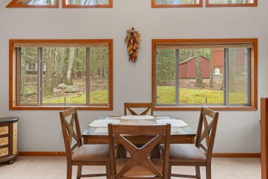 Discover the perfect mountain retreat at this contemporary home on Split Rock Resort and Country Club in Pennsylvania - for sale on GolfHomes.com, golf home, golf lot