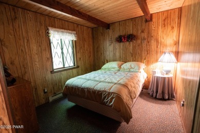 Welcome to this classic Pocono lake chalet, nestled in the heart on The Hideout Golf in Pennsylvania - for sale on GolfHomes.com, golf home, golf lot