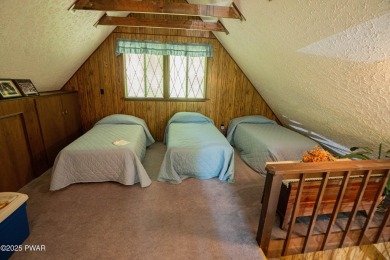 Welcome to this classic Pocono lake chalet, nestled in the heart on The Hideout Golf in Pennsylvania - for sale on GolfHomes.com, golf home, golf lot