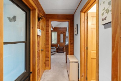 Discover the perfect mountain retreat at this contemporary home on Split Rock Resort and Country Club in Pennsylvania - for sale on GolfHomes.com, golf home, golf lot