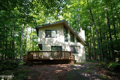 Welcome to this classic Pocono lake chalet, nestled in the heart on The Hideout Golf in Pennsylvania - for sale on GolfHomes.com, golf home, golf lot