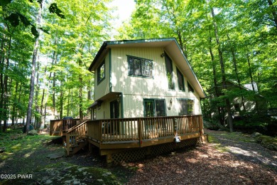 Welcome to this classic Pocono lake chalet, nestled in the heart on The Hideout Golf in Pennsylvania - for sale on GolfHomes.com, golf home, golf lot