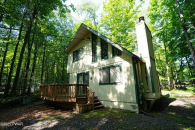 Welcome to this classic Pocono lake chalet, nestled in the heart on The Hideout Golf in Pennsylvania - for sale on GolfHomes.com, golf home, golf lot