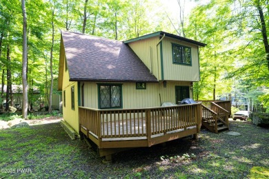 Welcome to this classic Pocono lake chalet, nestled in the heart on The Hideout Golf in Pennsylvania - for sale on GolfHomes.com, golf home, golf lot