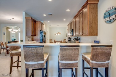 Welcome to this beautifully maintained lakefront home offering on Royal Tee Country Club in Florida - for sale on GolfHomes.com, golf home, golf lot