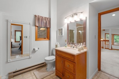 Discover the perfect mountain retreat at this contemporary home on Split Rock Resort and Country Club in Pennsylvania - for sale on GolfHomes.com, golf home, golf lot
