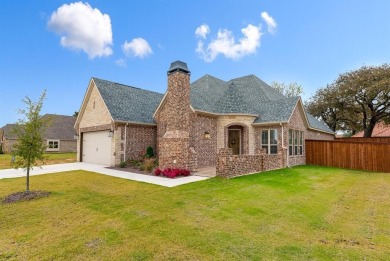 Former model home back on market! This highly energy efficient on Harbor Lakes Golf Club in Texas - for sale on GolfHomes.com, golf home, golf lot