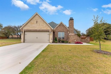 Former model home back on market! This highly energy efficient on Harbor Lakes Golf Club in Texas - for sale on GolfHomes.com, golf home, golf lot