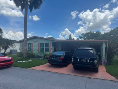 BEAUTIFUL 2 BEDROOM / 2 BATH MOBILE HOME ... READY TO MOVE INTO: on The Meadows At Countrywood in Florida - for sale on GolfHomes.com, golf home, golf lot