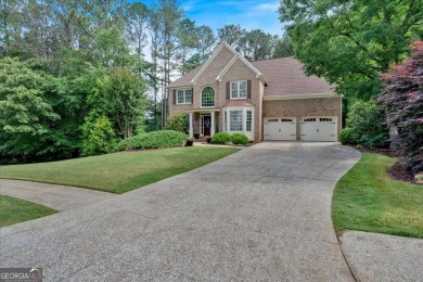 Welcome to this stunning 5 bedroom/4 Bath executive residence on Towne Lake Hills Golf Club in Georgia - for sale on GolfHomes.com, golf home, golf lot