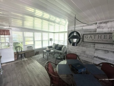 BEAUTIFUL 2 BEDROOM / 2 BATH MOBILE HOME ... READY TO MOVE INTO: on The Meadows At Countrywood in Florida - for sale on GolfHomes.com, golf home, golf lot