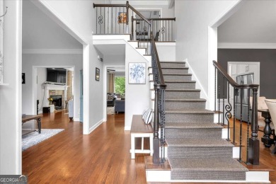 Welcome to this stunning 5 bedroom/4 Bath executive residence on Towne Lake Hills Golf Club in Georgia - for sale on GolfHomes.com, golf home, golf lot