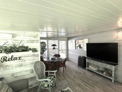 BEAUTIFUL 2 BEDROOM / 2 BATH MOBILE HOME ... READY TO MOVE INTO: on The Meadows At Countrywood in Florida - for sale on GolfHomes.com, golf home, golf lot
