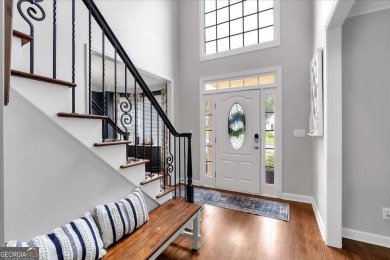 Welcome to this stunning 5 bedroom/4 Bath executive residence on Towne Lake Hills Golf Club in Georgia - for sale on GolfHomes.com, golf home, golf lot