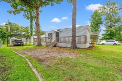 Crystal Lake is a short golf cart ride to Myrtle Beach State on Prestwick Country Club in South Carolina - for sale on GolfHomes.com, golf home, golf lot