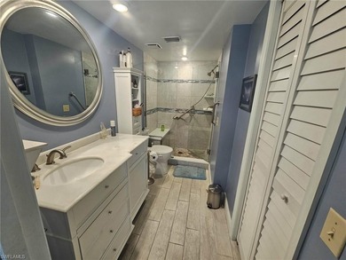 Beautifully updated 1st floor end unit with fantastic lake and on Countryside Golf and Country Club in Florida - for sale on GolfHomes.com, golf home, golf lot