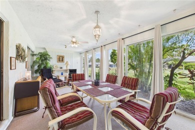 Welcome to this charming and spacious 2-bedroom, 2-bath end-unit on Palm Aire Country Club of Sarasota in Florida - for sale on GolfHomes.com, golf home, golf lot