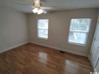 Two Bedroom, one and one half bath unit across the street from on The Hackler Course at Coastal Carolina University in South Carolina - for sale on GolfHomes.com, golf home, golf lot
