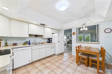 Welcome to this charming and spacious 2-bedroom, 2-bath end-unit on Palm Aire Country Club of Sarasota in Florida - for sale on GolfHomes.com, golf home, golf lot
