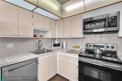 This spacious 2-Bedroom, 2-Bathroom condo offers breathtaking on Palm-Aire Country Club and Resort - Palms in Florida - for sale on GolfHomes.com, golf home, golf lot