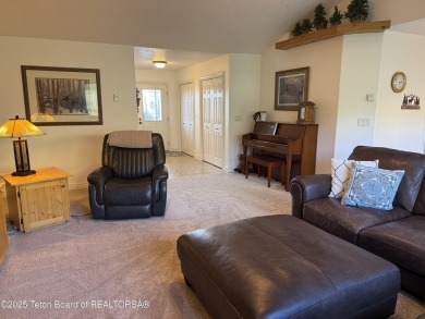 Stunning Home with Panoramic Views in Star Valley Ranch. If on Star Valley RV Golf Course in Wyoming - for sale on GolfHomes.com, golf home, golf lot