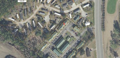 Two Bedroom, one and one half bath unit across the street from on The Hackler Course at Coastal Carolina University in South Carolina - for sale on GolfHomes.com, golf home, golf lot
