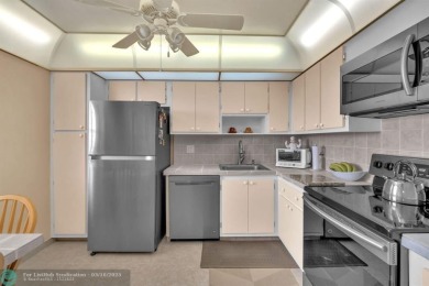 This spacious 2-Bedroom, 2-Bathroom condo offers breathtaking on Palm-Aire Country Club and Resort - Palms in Florida - for sale on GolfHomes.com, golf home, golf lot