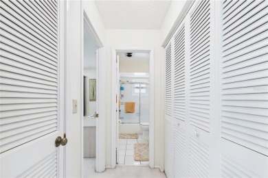 Welcome to this charming and spacious 2-bedroom, 2-bath end-unit on Palm Aire Country Club of Sarasota in Florida - for sale on GolfHomes.com, golf home, golf lot