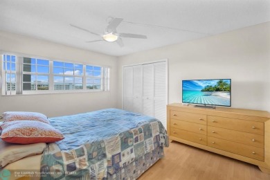 This spacious 2-Bedroom, 2-Bathroom condo offers breathtaking on Palm-Aire Country Club and Resort - Palms in Florida - for sale on GolfHomes.com, golf home, golf lot