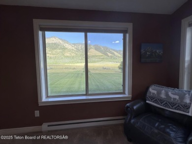 Stunning Home with Panoramic Views in Star Valley Ranch. If on Star Valley RV Golf Course in Wyoming - for sale on GolfHomes.com, golf home, golf lot