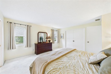 Welcome to this charming and spacious 2-bedroom, 2-bath end-unit on Palm Aire Country Club of Sarasota in Florida - for sale on GolfHomes.com, golf home, golf lot