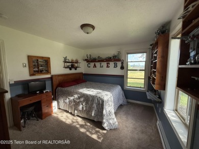 Stunning Home with Panoramic Views in Star Valley Ranch. If on Star Valley RV Golf Course in Wyoming - for sale on GolfHomes.com, golf home, golf lot