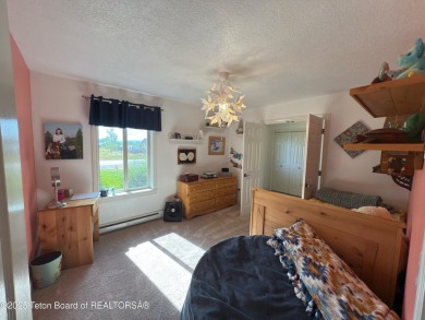 Stunning Home with Panoramic Views in Star Valley Ranch. If on Star Valley RV Golf Course in Wyoming - for sale on GolfHomes.com, golf home, golf lot