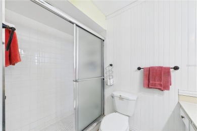 Welcome to this charming and spacious 2-bedroom, 2-bath end-unit on Palm Aire Country Club of Sarasota in Florida - for sale on GolfHomes.com, golf home, golf lot