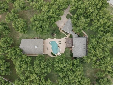 Impressive 3,066 SF custom home with heavily treed lot poised on on Nutcracker Golf Club in Texas - for sale on GolfHomes.com, golf home, golf lot