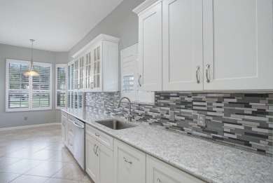 Beautiful 3/2/2 pool home located on oversized lot on the golf on Meadowood Golf and Tennis Club in Florida - for sale on GolfHomes.com, golf home, golf lot