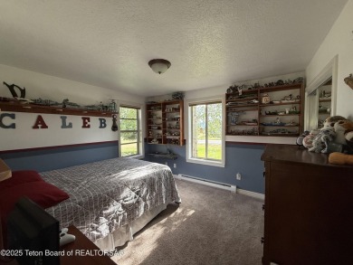Stunning Home with Panoramic Views in Star Valley Ranch. If on Star Valley RV Golf Course in Wyoming - for sale on GolfHomes.com, golf home, golf lot