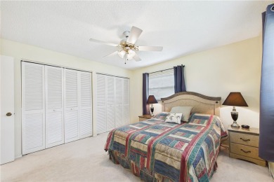Welcome to this charming and spacious 2-bedroom, 2-bath end-unit on Palm Aire Country Club of Sarasota in Florida - for sale on GolfHomes.com, golf home, golf lot