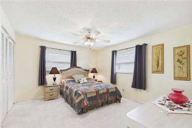 Welcome to this charming and spacious 2-bedroom, 2-bath end-unit on Palm Aire Country Club of Sarasota in Florida - for sale on GolfHomes.com, golf home, golf lot