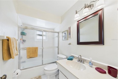 Welcome to this charming and spacious 2-bedroom, 2-bath end-unit on Palm Aire Country Club of Sarasota in Florida - for sale on GolfHomes.com, golf home, golf lot