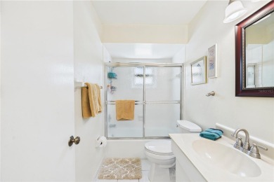 Welcome to this charming and spacious 2-bedroom, 2-bath end-unit on Palm Aire Country Club of Sarasota in Florida - for sale on GolfHomes.com, golf home, golf lot