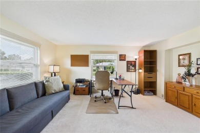 Welcome to this charming and spacious 2-bedroom, 2-bath end-unit on Palm Aire Country Club of Sarasota in Florida - for sale on GolfHomes.com, golf home, golf lot