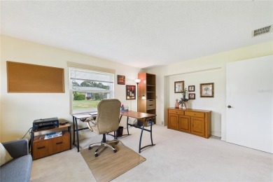 Welcome to this charming and spacious 2-bedroom, 2-bath end-unit on Palm Aire Country Club of Sarasota in Florida - for sale on GolfHomes.com, golf home, golf lot