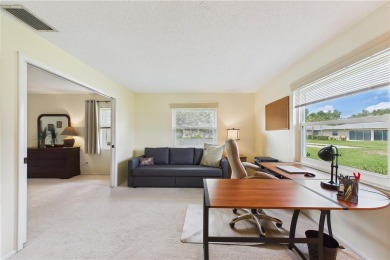 Welcome to this charming and spacious 2-bedroom, 2-bath end-unit on Palm Aire Country Club of Sarasota in Florida - for sale on GolfHomes.com, golf home, golf lot