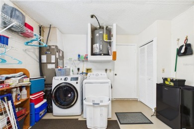 Welcome to this charming and spacious 2-bedroom, 2-bath end-unit on Palm Aire Country Club of Sarasota in Florida - for sale on GolfHomes.com, golf home, golf lot