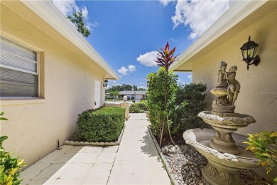 Welcome to this charming and spacious 2-bedroom, 2-bath end-unit on Palm Aire Country Club of Sarasota in Florida - for sale on GolfHomes.com, golf home, golf lot