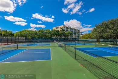 This spacious 2-Bedroom, 2-Bathroom condo offers breathtaking on Palm-Aire Country Club and Resort - Palms in Florida - for sale on GolfHomes.com, golf home, golf lot