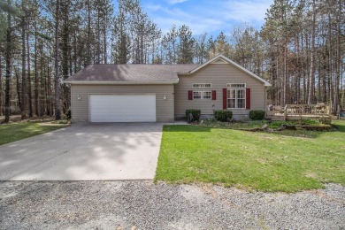 Great location across from the Hemlock Golf Course! This on Hemlock Golf Club in Michigan - for sale on GolfHomes.com, golf home, golf lot