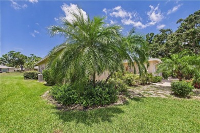 Welcome to this charming and spacious 2-bedroom, 2-bath end-unit on Palm Aire Country Club of Sarasota in Florida - for sale on GolfHomes.com, golf home, golf lot