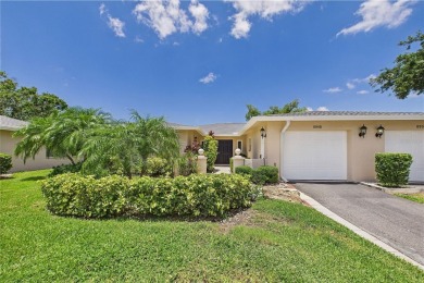 Welcome to this charming and spacious 2-bedroom, 2-bath end-unit on Palm Aire Country Club of Sarasota in Florida - for sale on GolfHomes.com, golf home, golf lot
